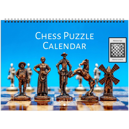 Chess Puzzle Calendar with decorative chess pieces on a blue background