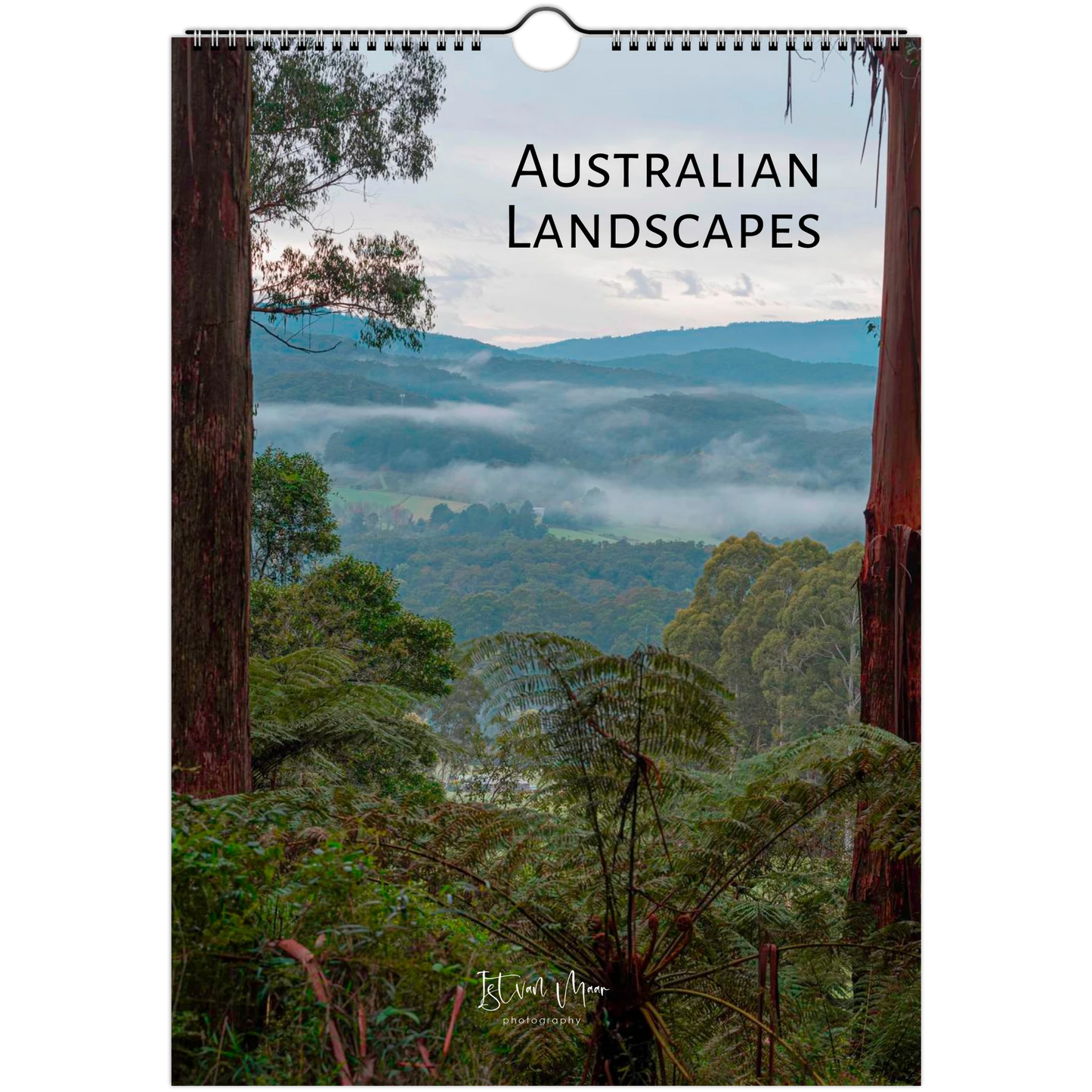 A spiral-bound wall calendar featuring a scenic photograph of misty Australian landscapes with ferns and forested hills. The title 'AUSTRALIAN LANDSCAPES' appears at the top, available in A4, A3, LT and Ledger sizes.
