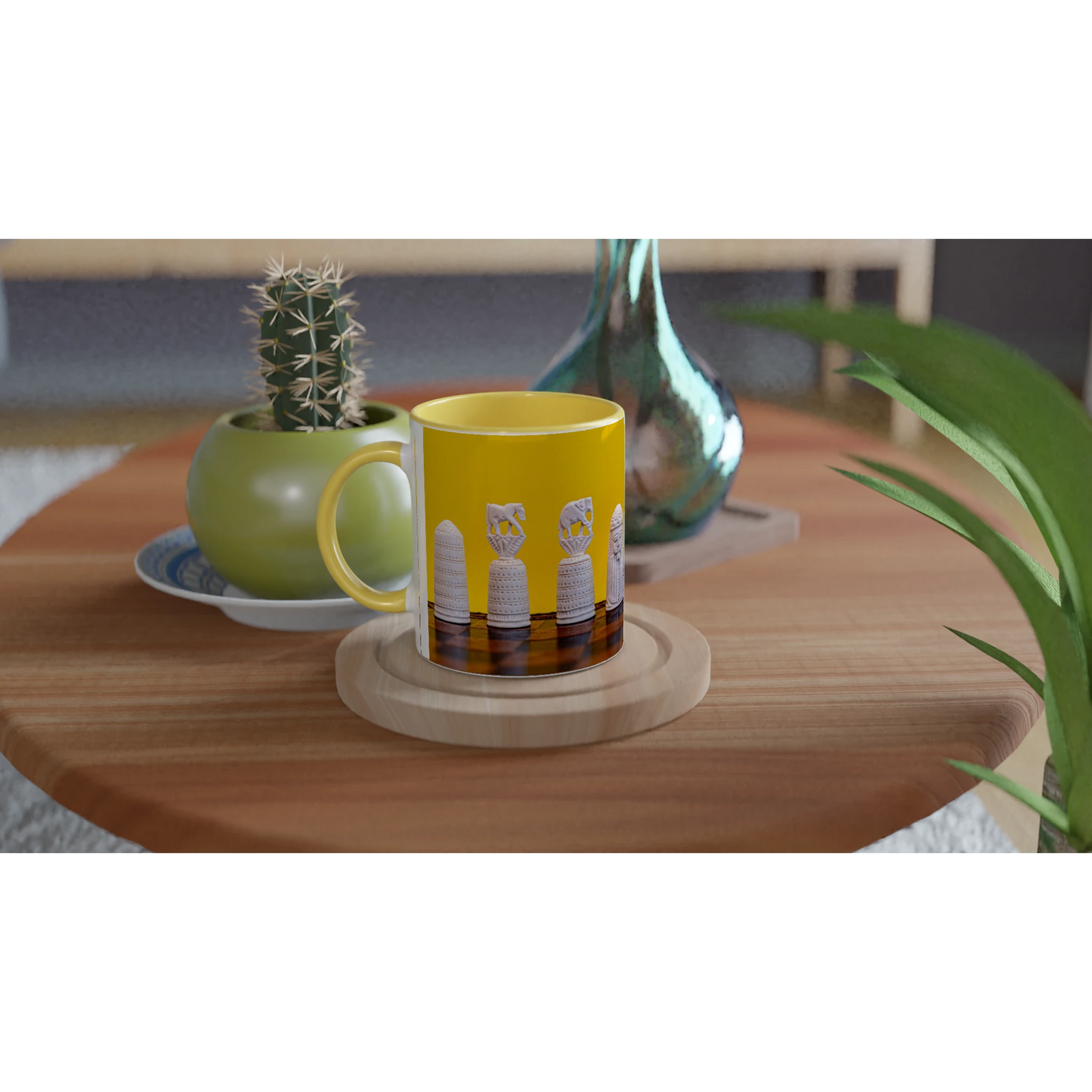 A yellow ceramic mug with a handle, featuring a graphic of four white bottles on a dark brown background, resting on a round wooden coaster on a wooden table. The background is a styled interior scene with a small potted cactus and other decor.