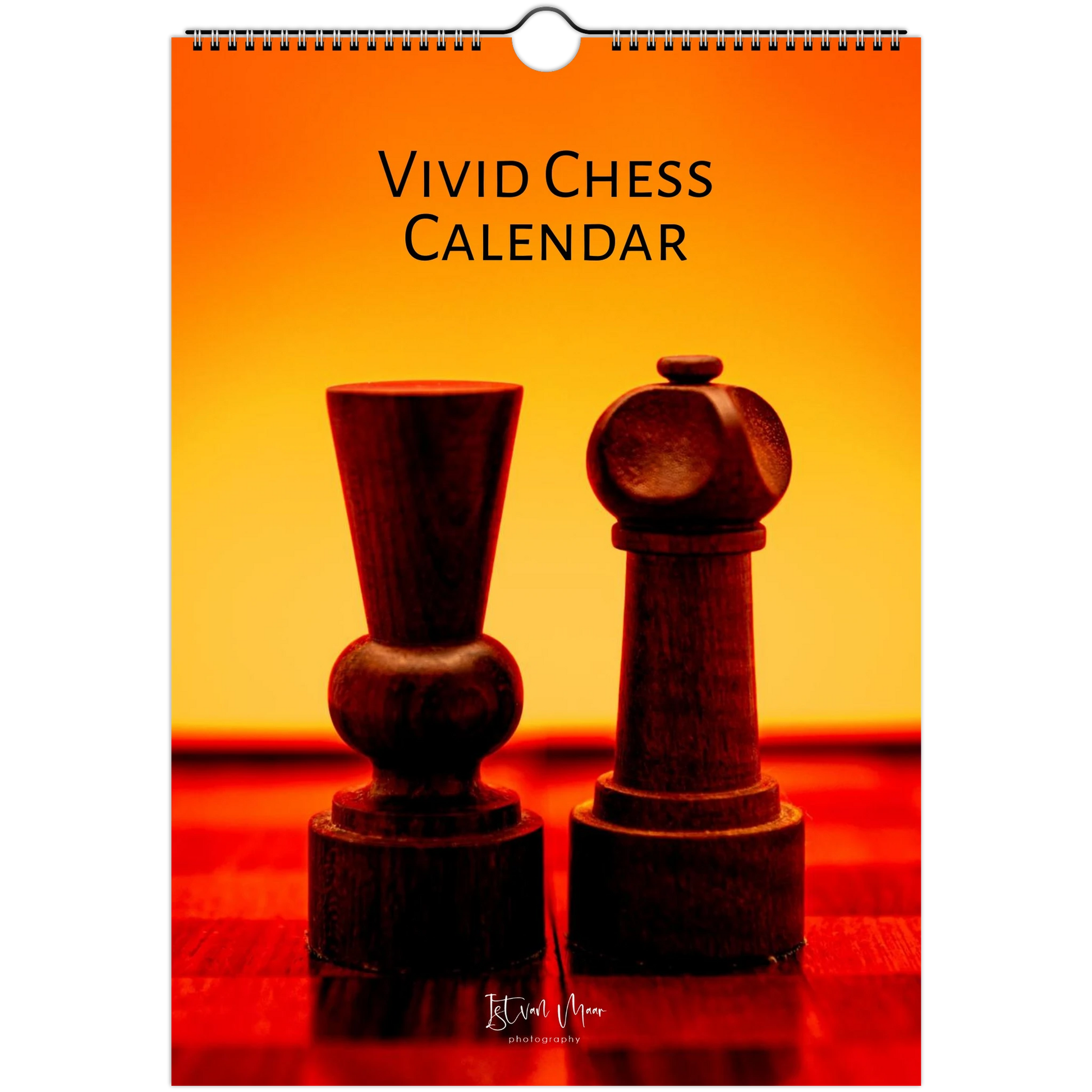 A hanging wall calendar titled 'VIVID CHESS CALENDAR' with a spiral binding at the top. The cover features a warm orange-to-yellow gradient background with two dark wooden chess pieces on a red surface.