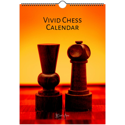 A hanging wall calendar titled 'VIVID CHESS CALENDAR' with a spiral binding at the top. The cover features a warm orange-to-yellow gradient background with two dark wooden chess pieces on a red surface.