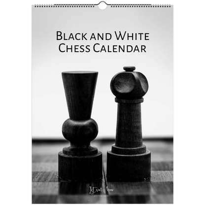 Black and white chess calendar with two chess pieces on a wooden surface