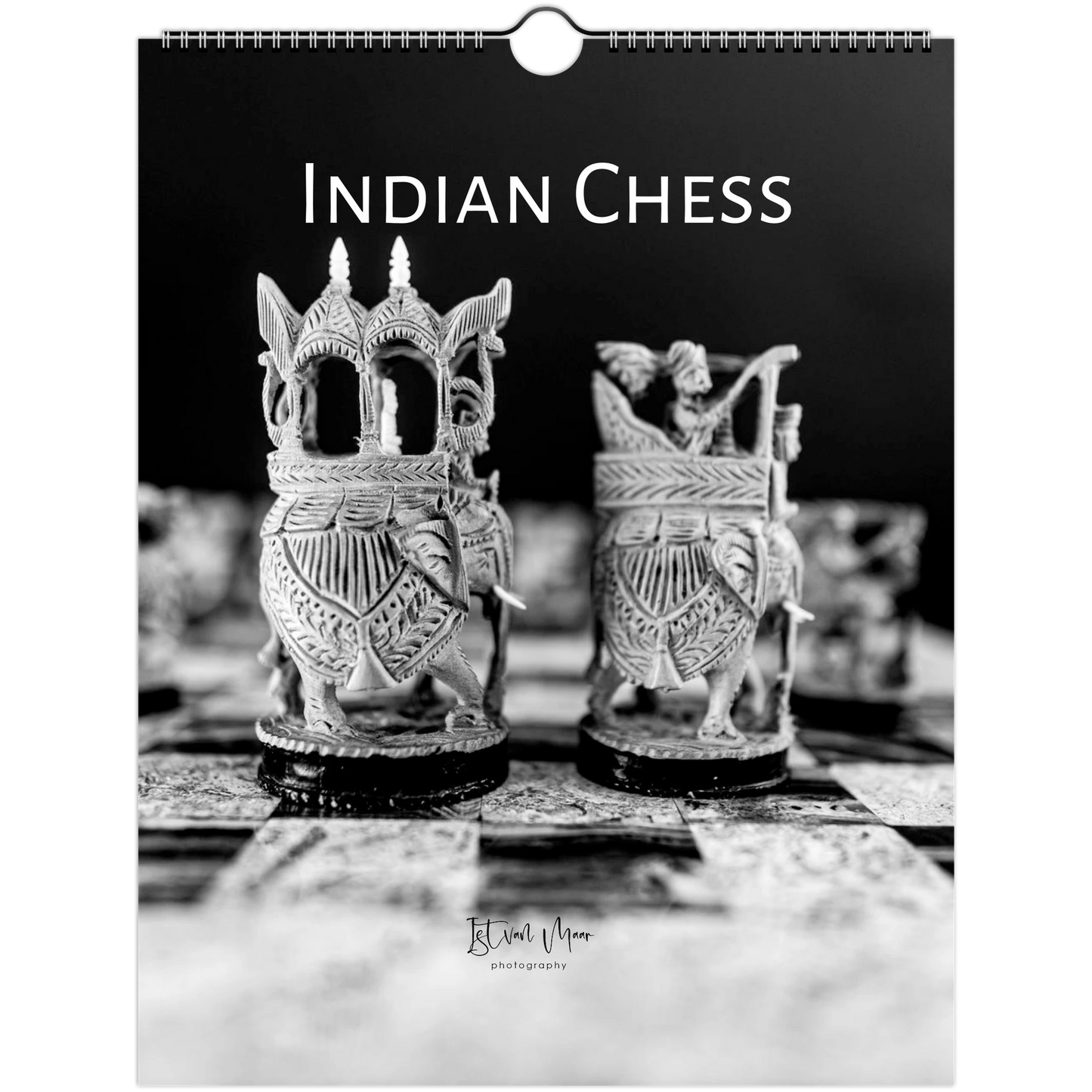 A black and white wall calendar featuring a photograph of ornate Indian chess pieces on a chessboard, with the title 'INDIAN CHESS' at the top.