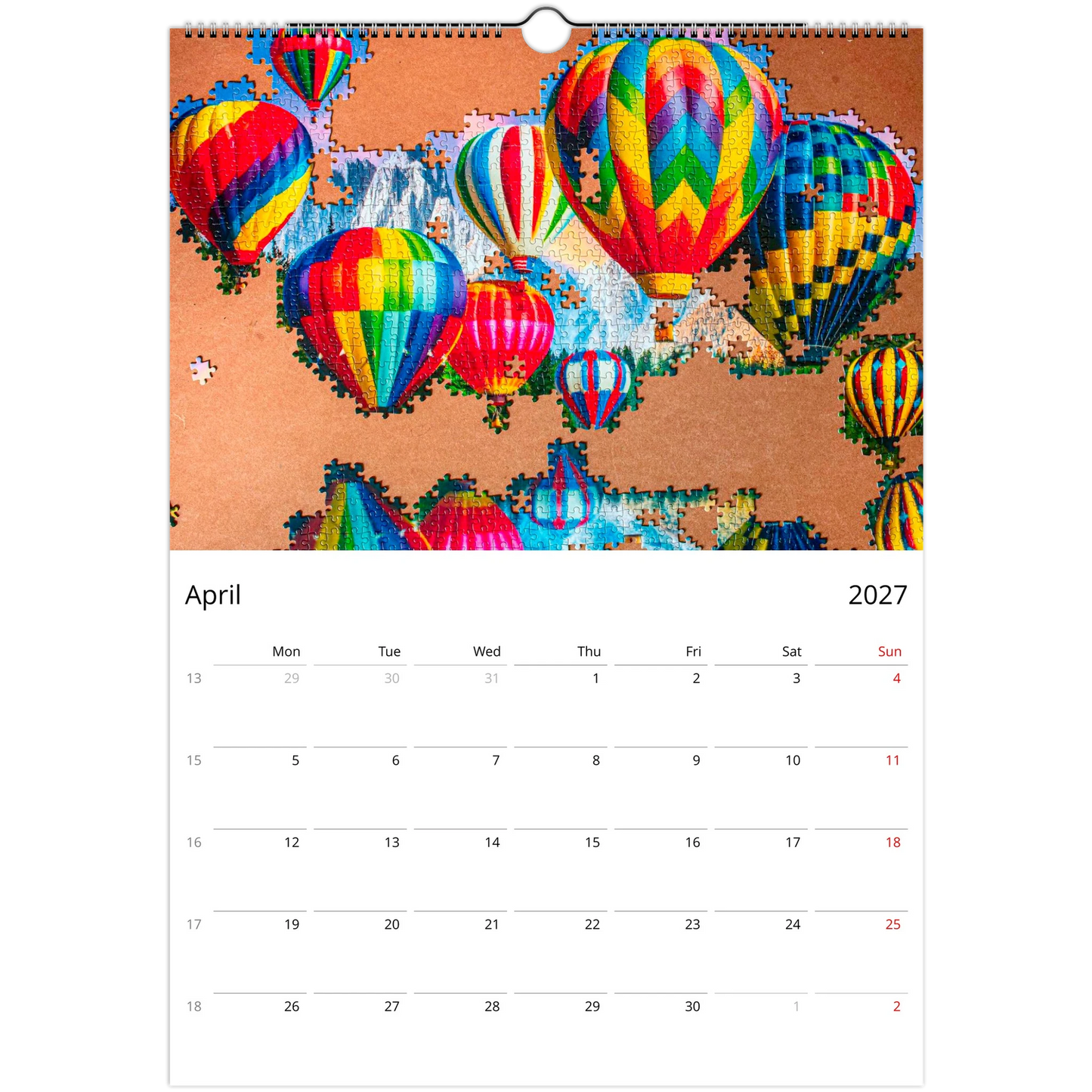 2027 Puzzle Wall Calendar – monthly spread with jigsaw puzzle photography