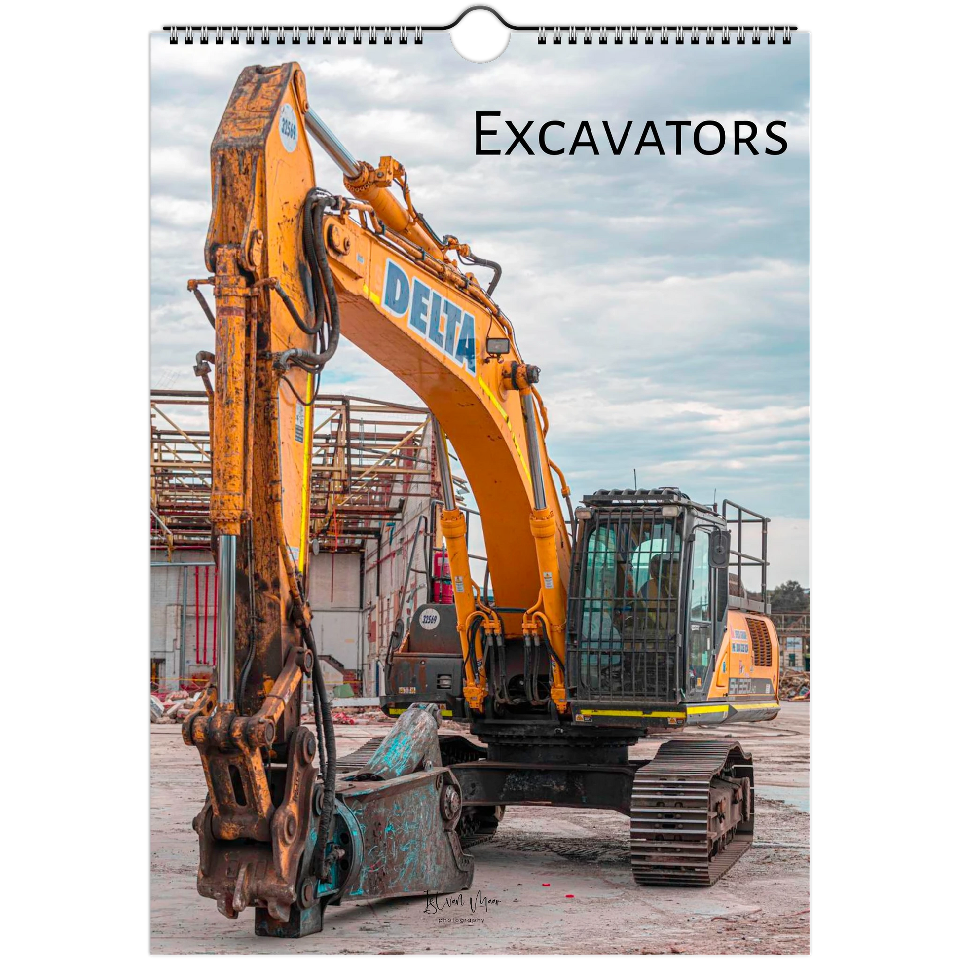 A spiral-bound wall calendar page featuring a large photograph of a yellow Delta excavator at a construction site, with the word 'Excavators' printed at the top.