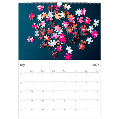 2027 Puzzle Wall Calendar – product packaging and spiral binding detail