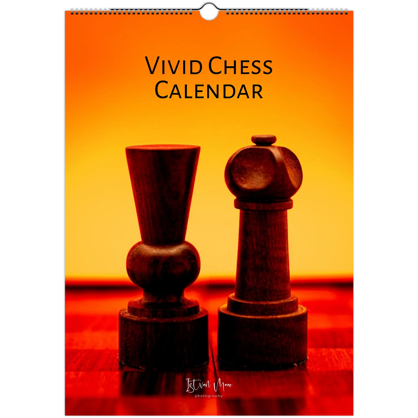 Vivid Chess Calendar with two wooden chess pieces on an orange background