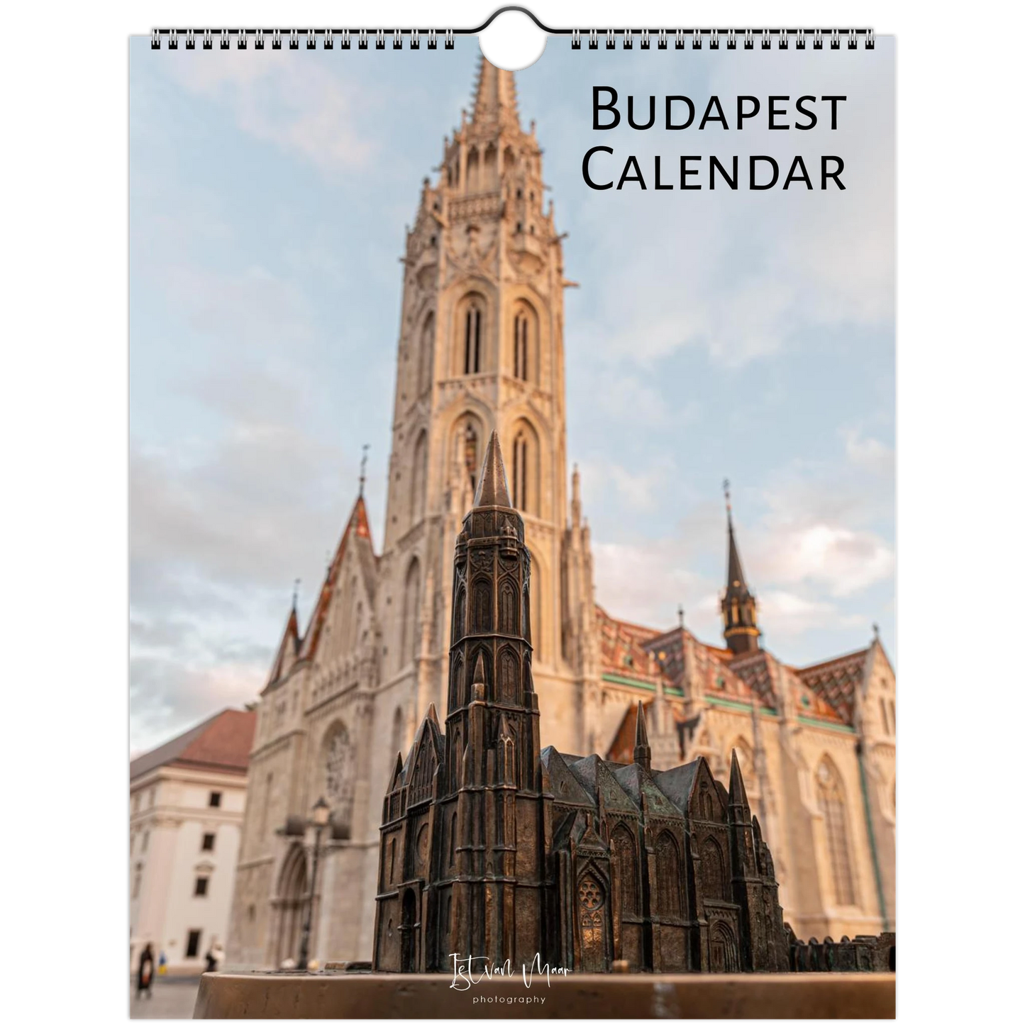 Budapest wall calendar featuring a photograph of the Matthias Church tower in Budapest, with a small architectural model in the foreground and the text 'BUDAPEST CALENDAR' at the top right.