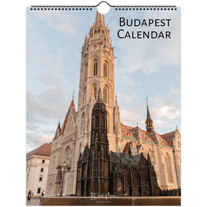 Budapest wall calendar featuring a photograph of the Matthias Church tower in Budapest, with a small architectural model in the foreground and the text 'BUDAPEST CALENDAR' at the top right.