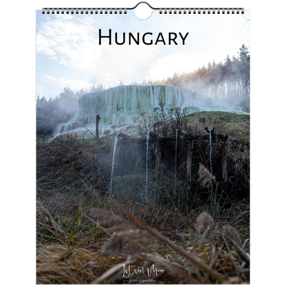 A spiral-bound wall calendar page featuring a scenic photograph of a waterfall in Hungary, with the word 'HUNGARY' printed at the top and a small 'Jezior Watel Photography' credit near the bottom.