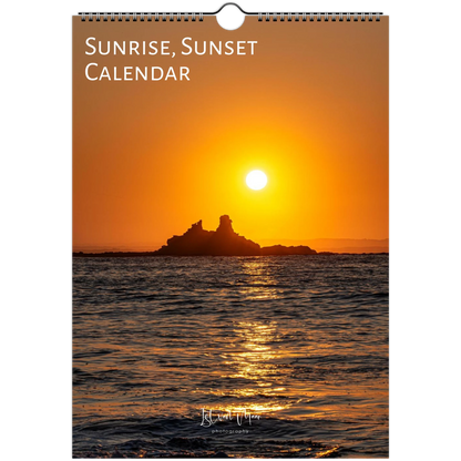 Calendar cover with a sunset over water and island, labeled 'Sunrise, Sunset Calendar'.
