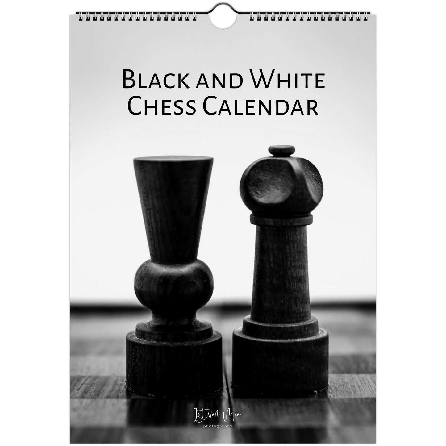 A black and white chess-themed calendar cover featuring two chess pawns on a dark surface against a light background, with the text 'BLACK AND WHITE CHESS CALENDAR' at the top and a hanging hole at the top center.
