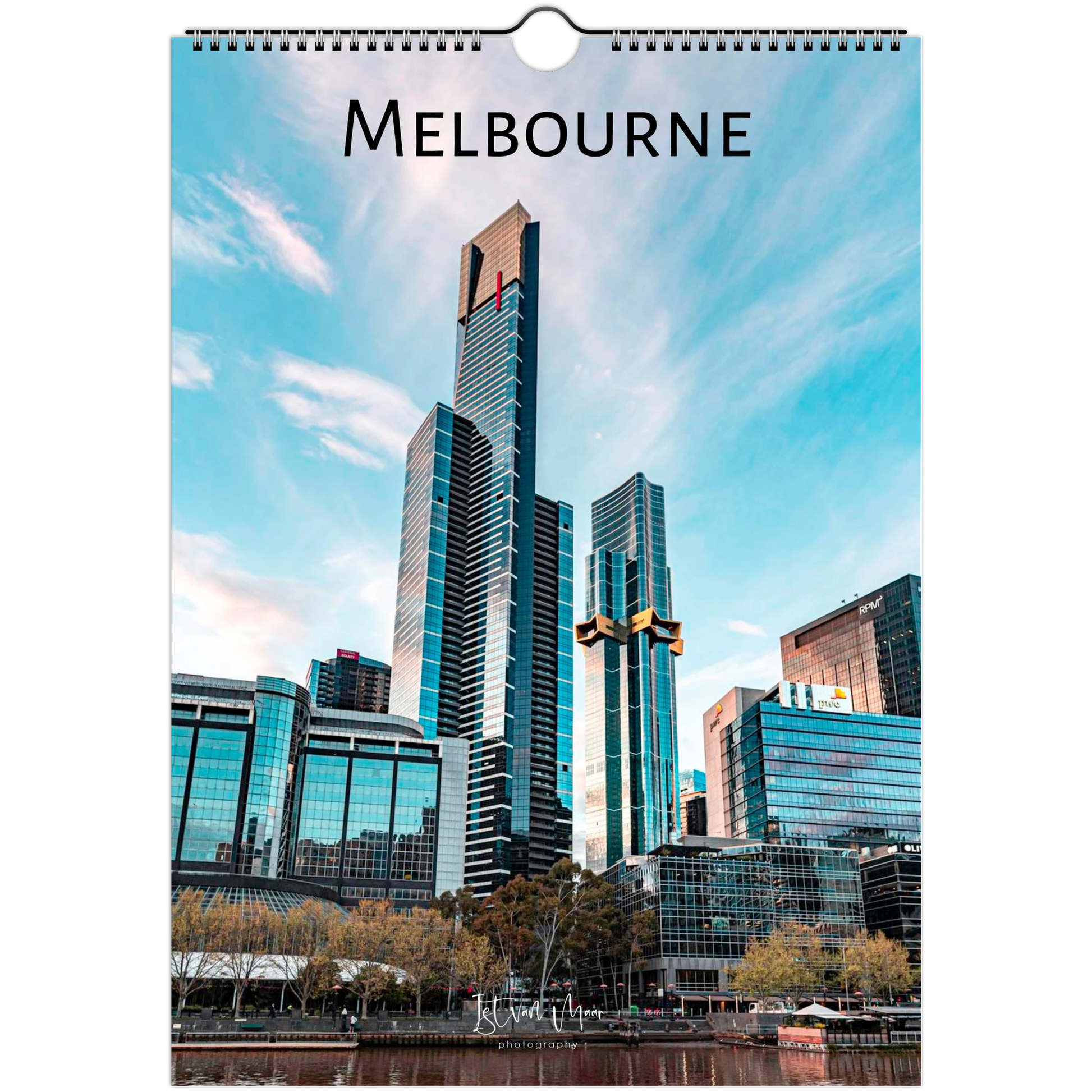 A spiral-bound wall calendar page featuring a photograph of Melbourne's skyline with the word 'MELBOURNE' printed at the top, shown against a plain white background.