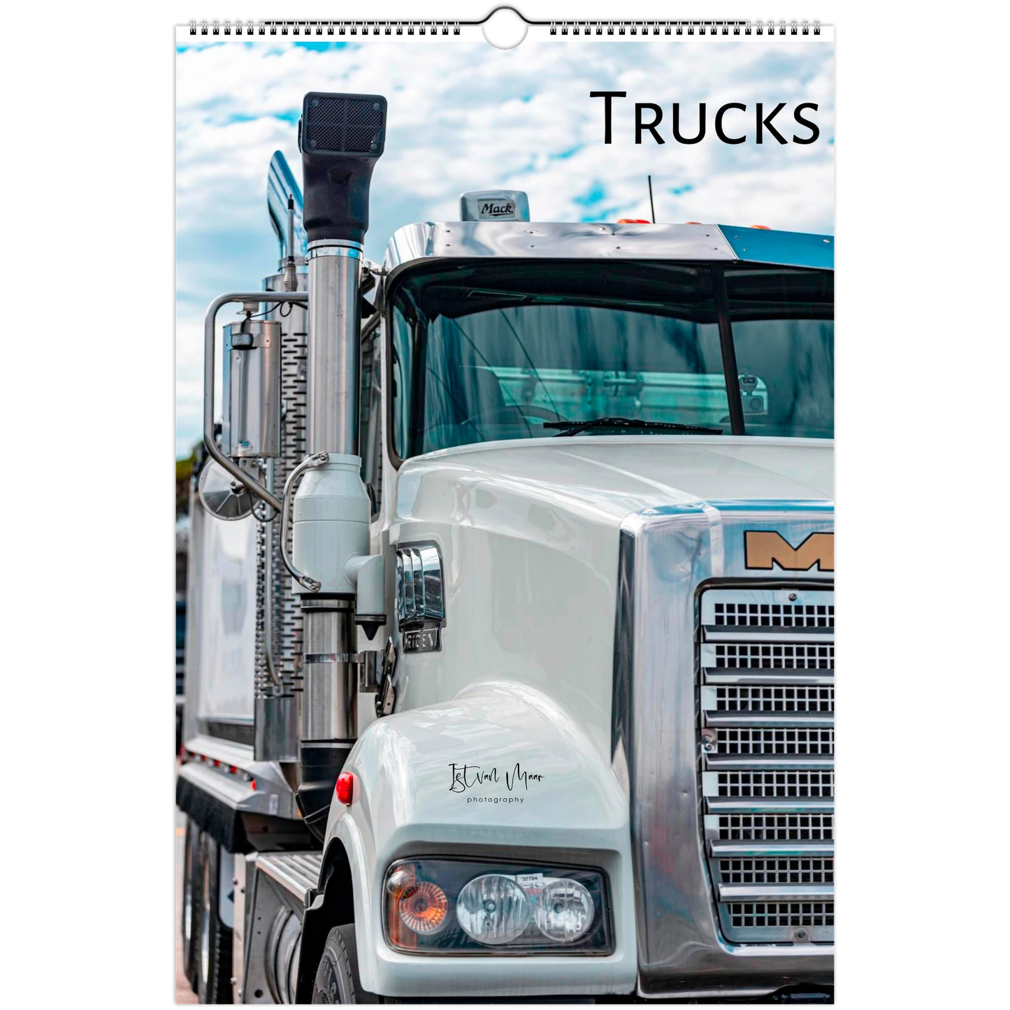A vertical wall calendar page featuring a close-up photograph of a white Mack semi-truck under a cloudy sky, with the word "TRUCKS" printed at the top. Cover of a personalised wall calendar by Istvan Maar Photography.