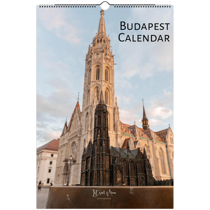 Budapest wall calendar featuring a photograph of the Matthias Church spire in Budapest, Hungary, with a small architectural model in the foreground. The title 'BUDAPEST CALENDAR' is printed at the top right, and the photographer's name 'Istvan Maar Photography' is visible at the bottom.