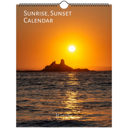 A spiral-bound wall calendar cover featuring a sunset over the ocean with a rocky island silhouette. The title 'SUNRISE, SUNSET CALENDAR' appears at the top in white text, and a small signature or brand mark is visible near the bottom. Available in A4, A3, LT and LG US sizes. Shipping worldwide.