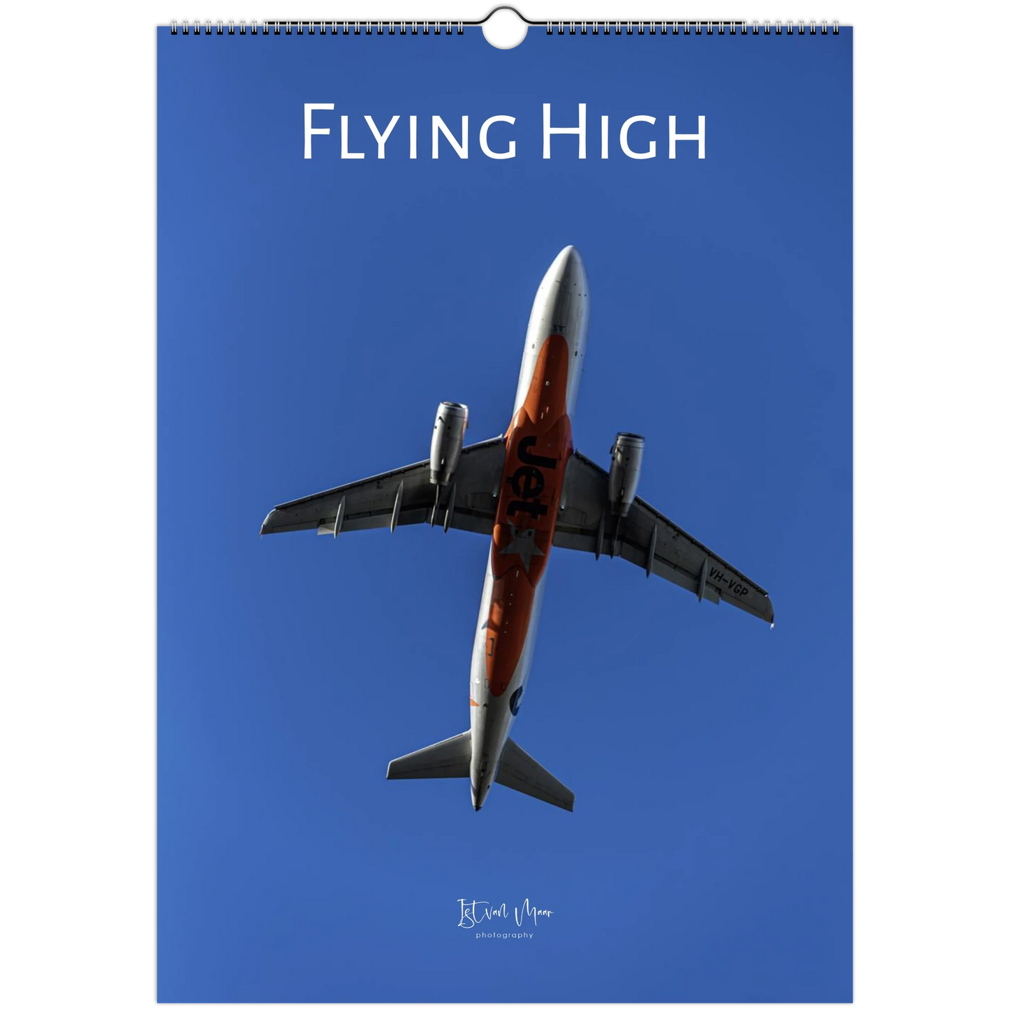 Calendar cover with an airplane and 'Flying High' text against a blue sky. Istvan Maar Photography, personalisable aviation wall calendar