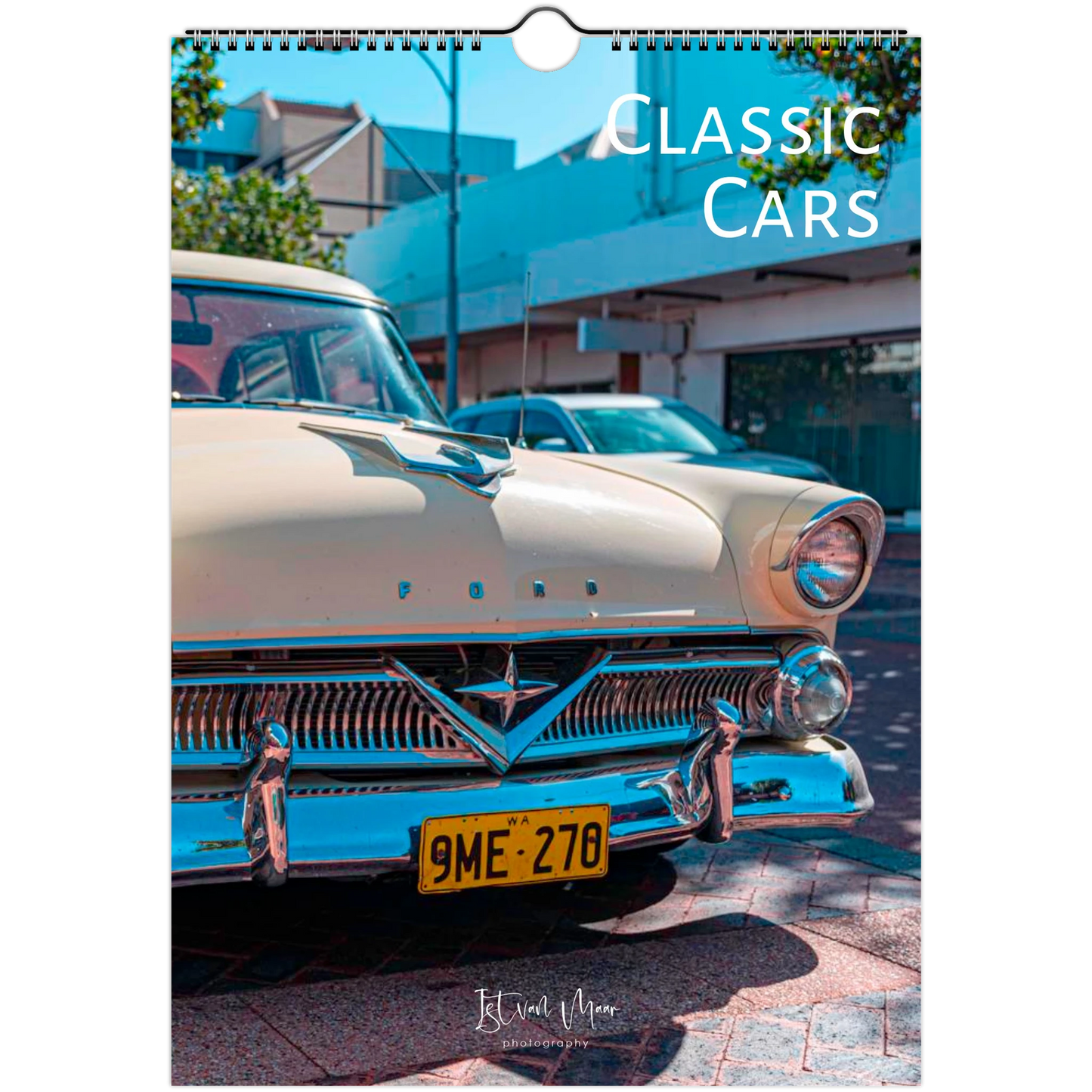 A spiral-bound wall calendar or print featuring a vintage cream-colored Ford car in an urban street setting, with the text 'CLASSIC CARS' at the top and a small 'Istvan Maar' signature at the bottom. Available in A4, A3, LT and Ledger sizes from Istvan Maar Photography.
