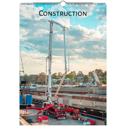 Construction calendar cover with crane and building site against a blue sky.