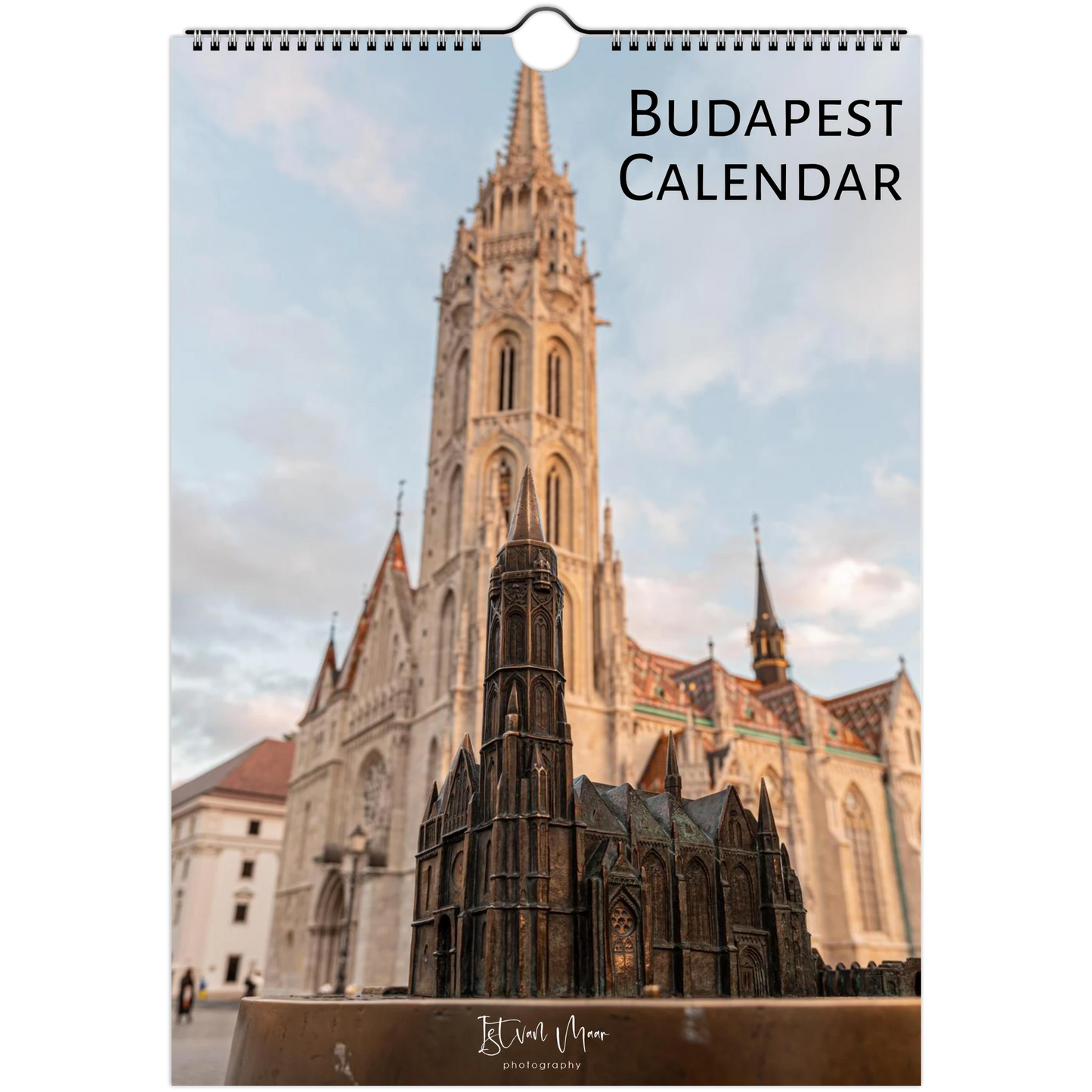A hanging wall calendar cover featuring a photograph of the Budapest cathedral and a small architectural model in the foreground, with the text 'BUDAPEST CALENDAR' at the top right.