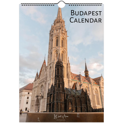 A hanging wall calendar cover featuring a photograph of the Budapest cathedral and a small architectural model in the foreground, with the text 'BUDAPEST CALENDAR' at the top right.