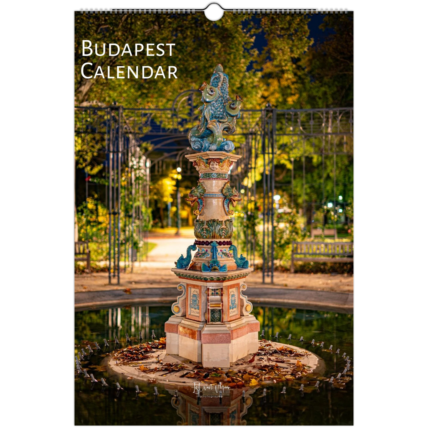 Budapest wall calendar featuring a nighttime photograph of a decorative fountain in a park, with the title 'BUDAPEST CALENDAR' printed at the top left.