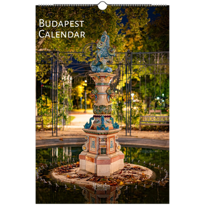Budapest wall calendar featuring a nighttime photograph of a decorative fountain in a park, with the title 'BUDAPEST CALENDAR' printed at the top left.