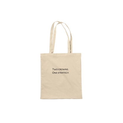 Beige tote bag with chess quote on a white background