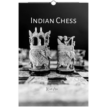 A black and white wall calendar page featuring a photograph of ornate Indian chess pieces on a board, with the title 'INDIAN CHESS' at the top and a small 'Istvan Maar photography' signature near the bottom.