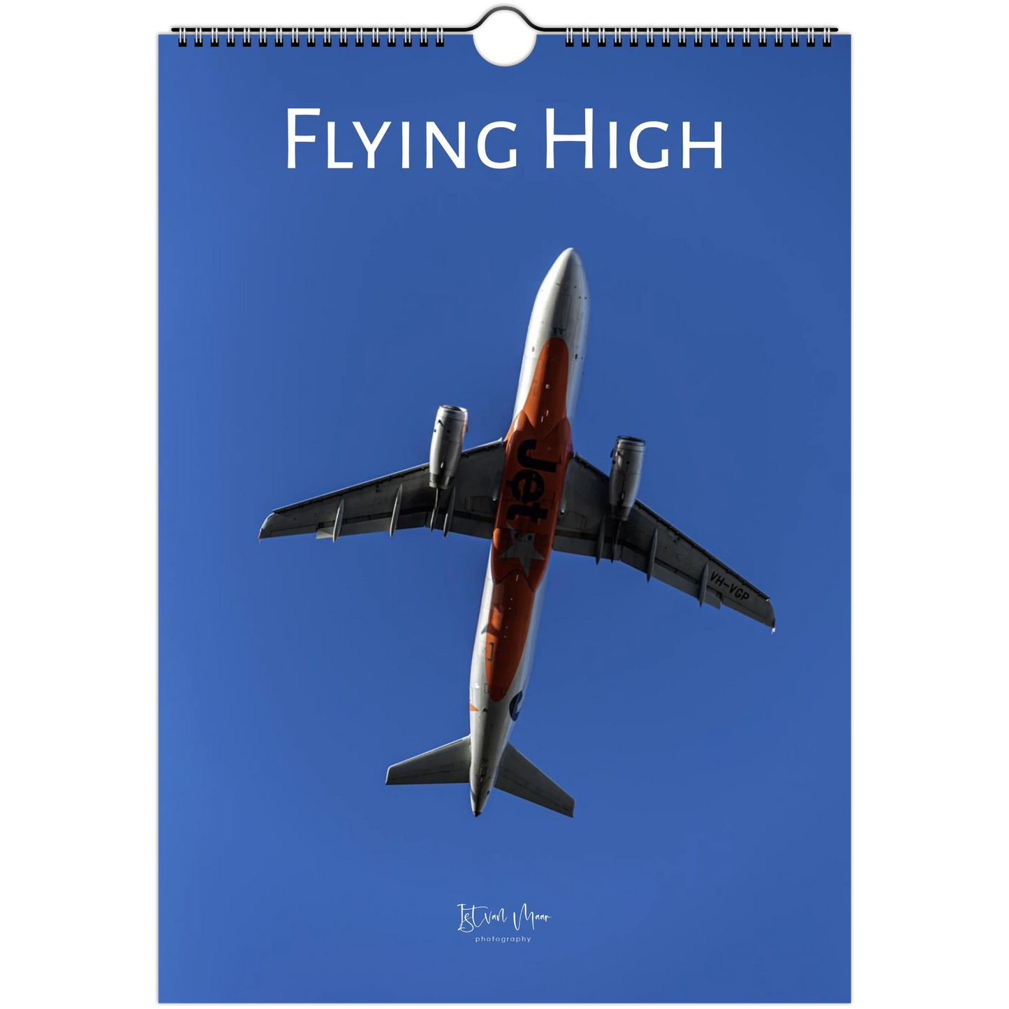 Calendar cover with an airplane and 'Flying High' text on a blue background