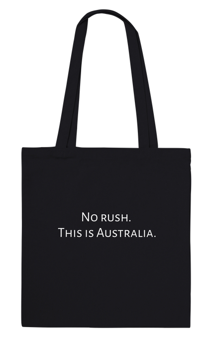 Back of black kangaroo tote bag showing personalised quote – No Rush This Is Australia