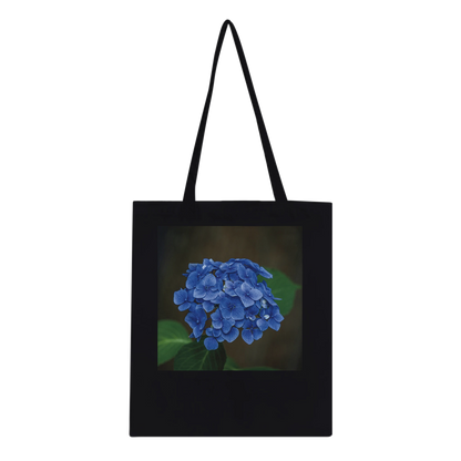 Blue hydrangea photograph printed on a black canvas tote bag, Classic style, front view