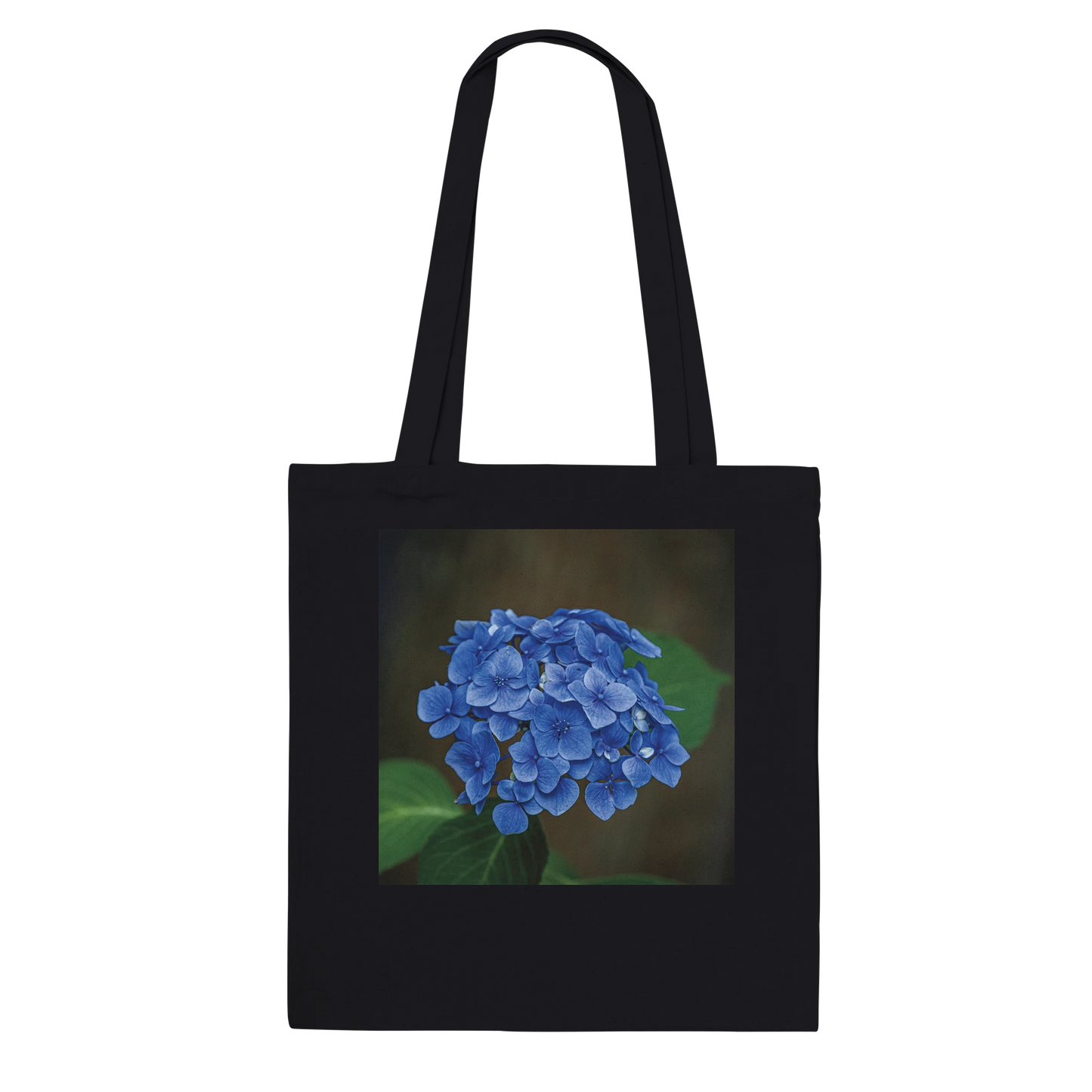 Blue hydrangea photograph printed on a black canvas tote bag, Premium style, front view