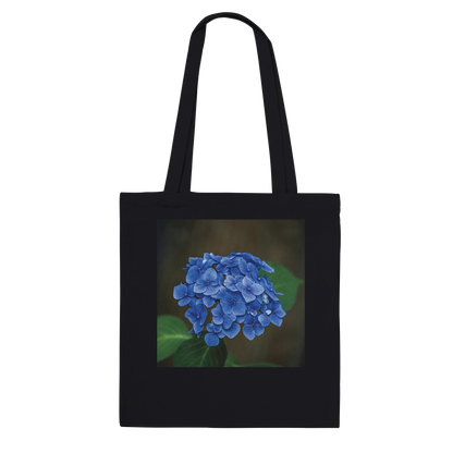 Blue hydrangea photograph printed on a black canvas tote bag, Premium style, front view