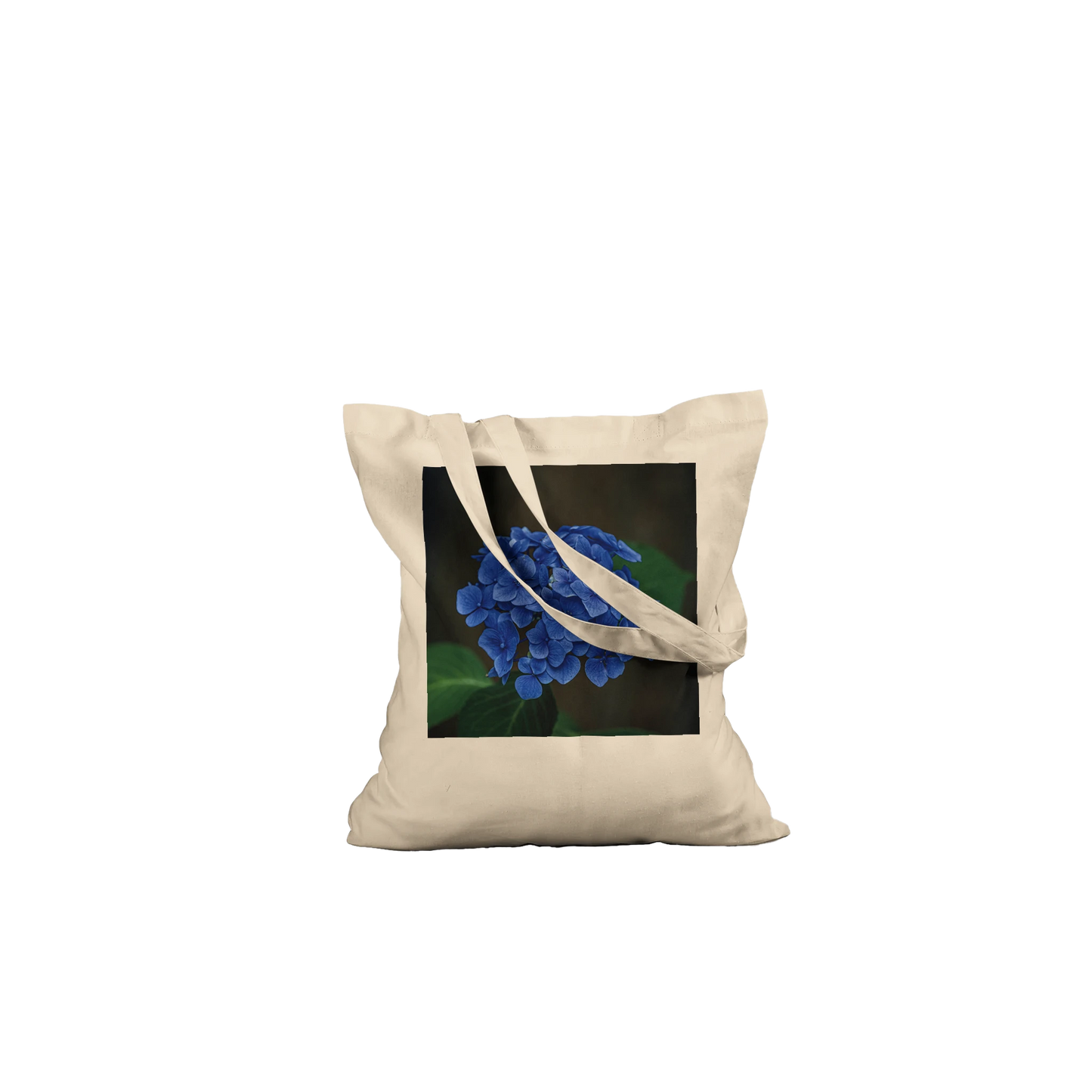 Blue hydrangea photograph printed on a natural canvas tote bag, Premium style, laid flat
