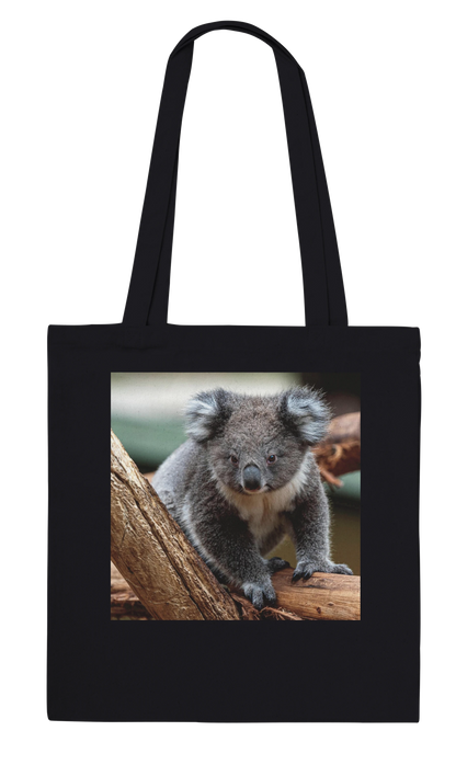 Koala photograph printed on a black canvas tote bag, Classic style, front view