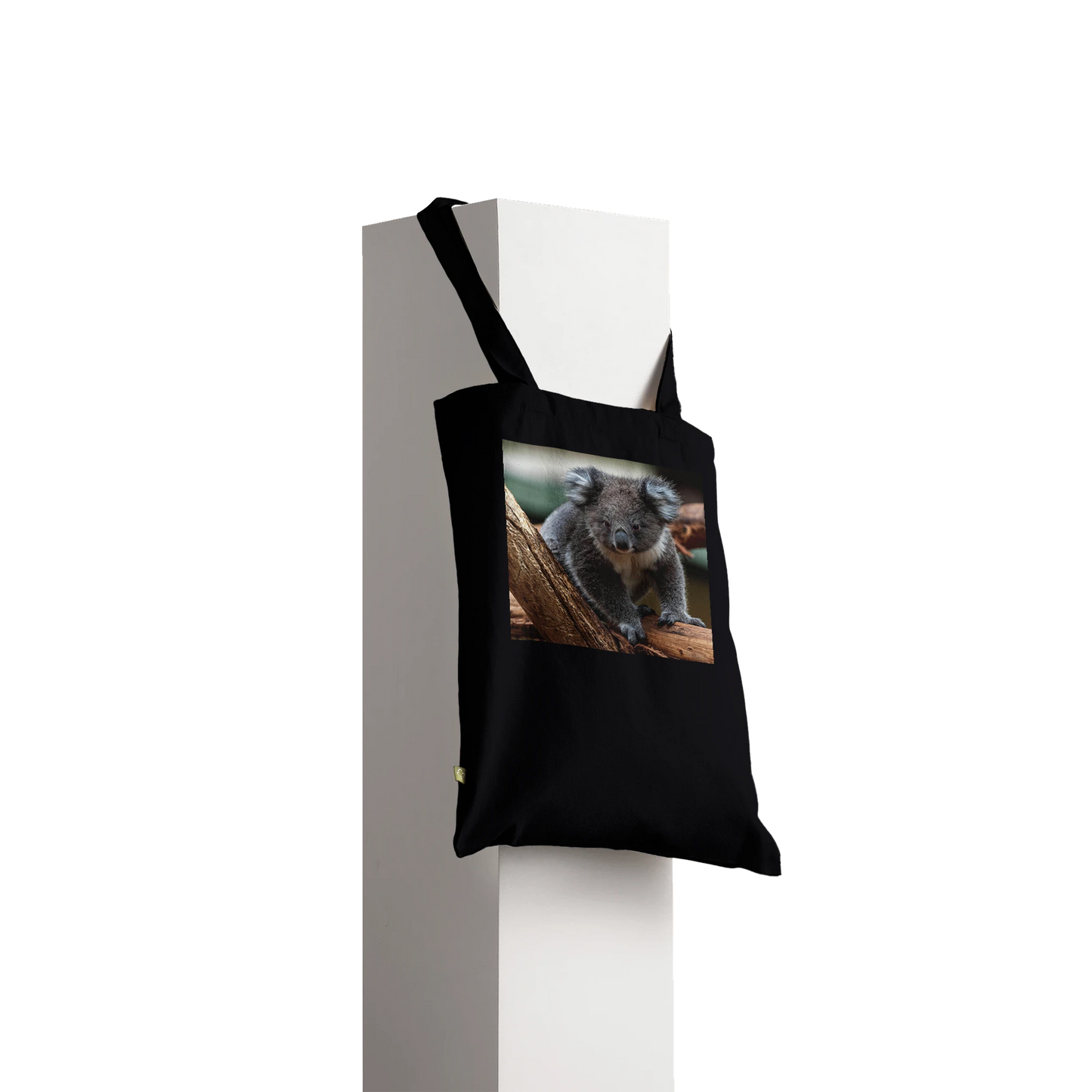 Koala photograph printed on a black canvas tote bag, Premium style, front view