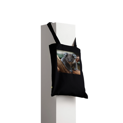 Koala photograph printed on a black canvas tote bag, Premium style, front view