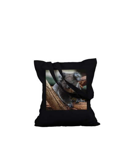 Koala photograph printed on a black canvas tote bag, Premium style, laid flat