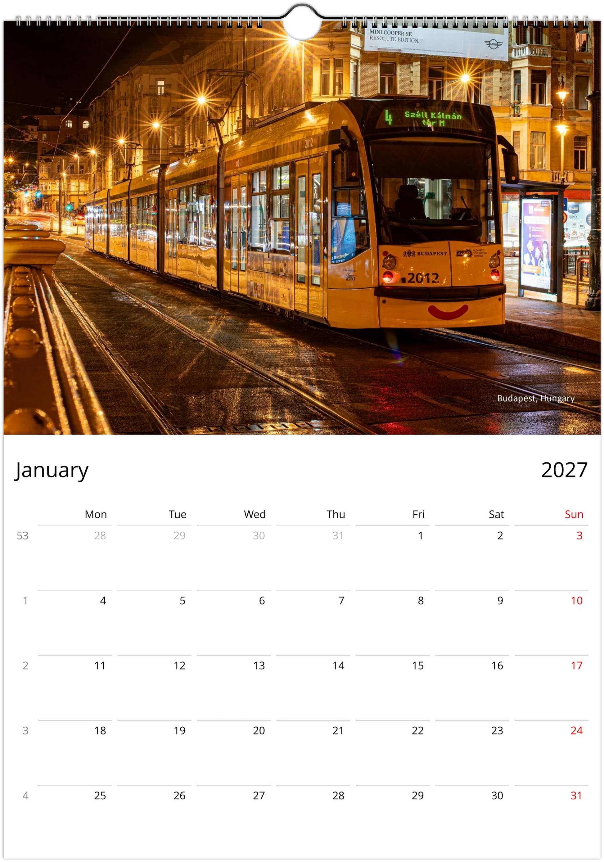 Yellow Budapest tram number 4 at night on a wet city street illuminated by warm golden street lights - Budapest Hungary - Trams After Dark wall calendar January