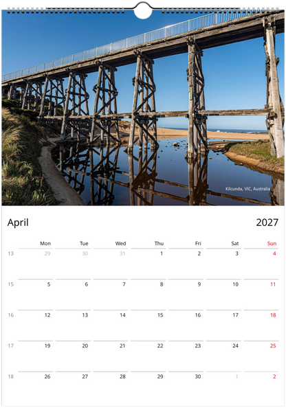 2027 Reflections Wall Calendar – April monthly spread with water reflection photography