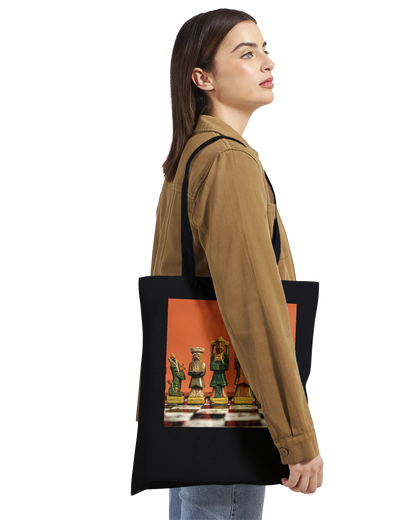 Woman carrying black premium chess tote bag side view – personalised hand painted chess set design by Istvan Maar Photography