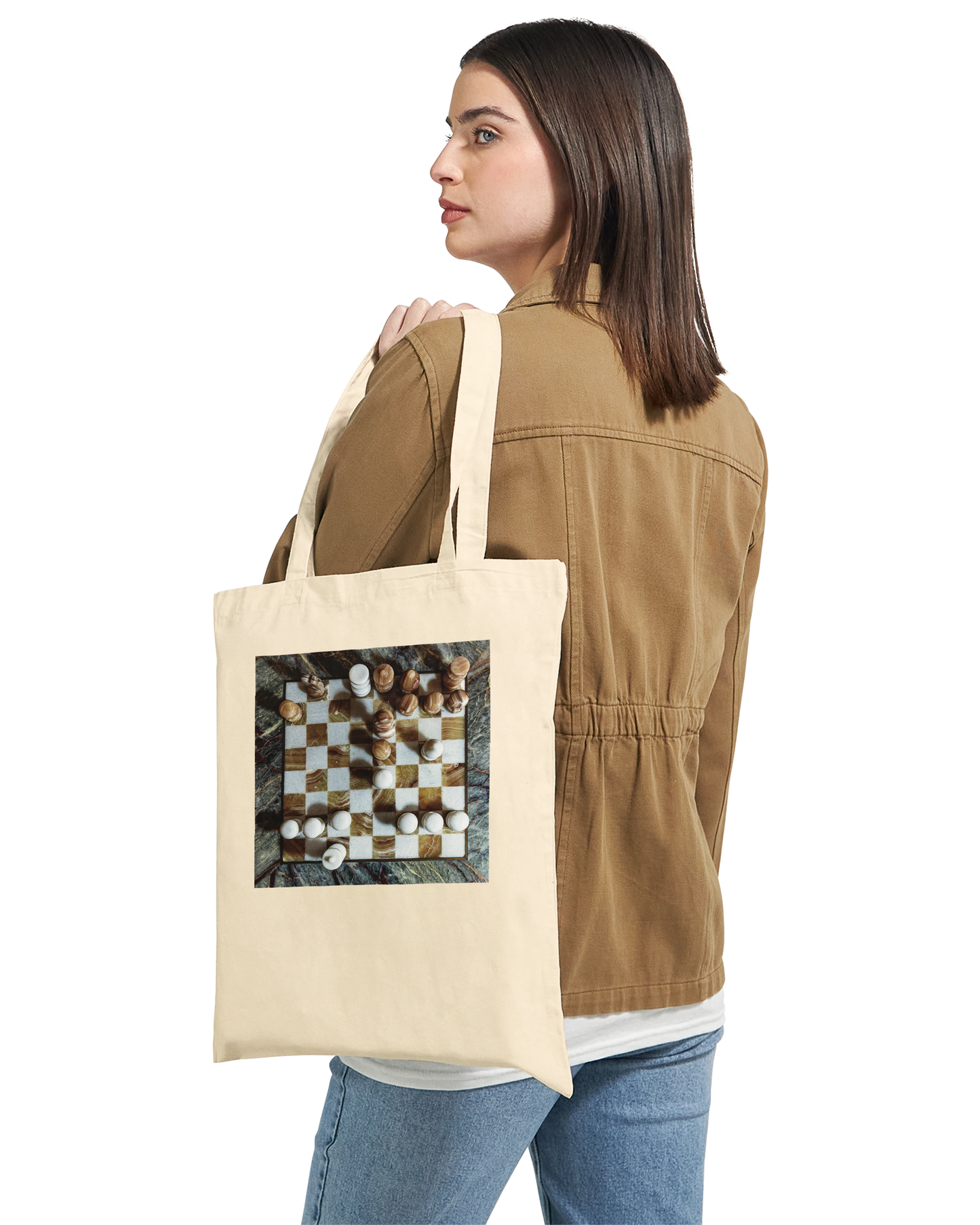 Woman carrying Carved from the Earth marble chess tote bag — Premium Natural