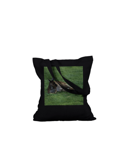 Premium black kangaroo tote bag flat lay on ground – Australian wildlife art canvas tote