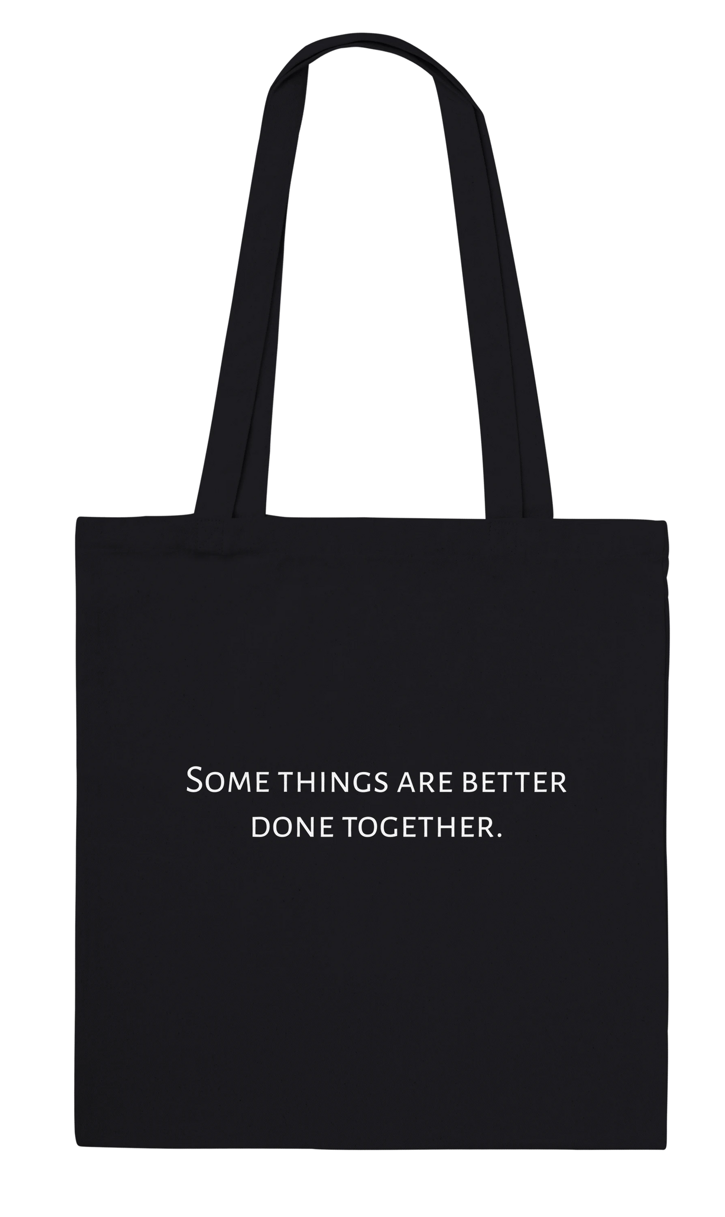 Three Pelicans canvas tote bag, black, back view with printed quote: Some things are better done together.