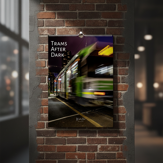 Trams After Dark A3 wall calendar mockup displayed on a dark urban wall with dramatic night tram photography - Istvan Maar Photography